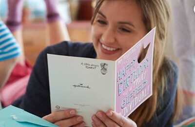 Woman reading a greeting card