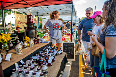 People shopping at the Farmers Market