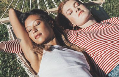 Women laying in a hammock