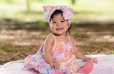 smiling baby on a blanket