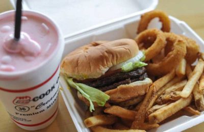 A shake, burger, fries and onion rings from Cookout