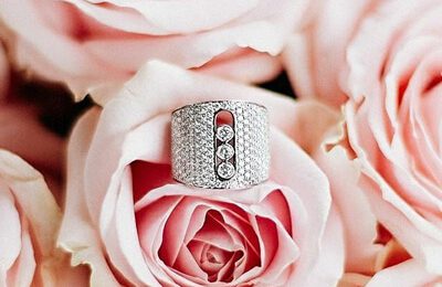 A diamond ring on a rose