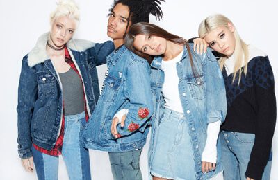 group of women modeling denim