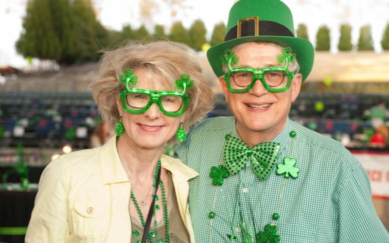 couple with green shamrock glasses