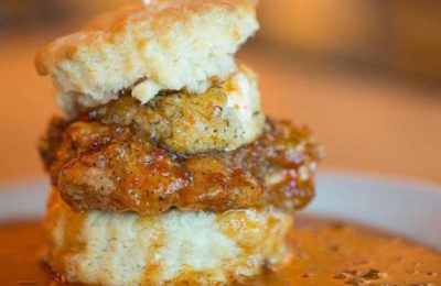 A delicious grilled chicken on biscuit sandwich