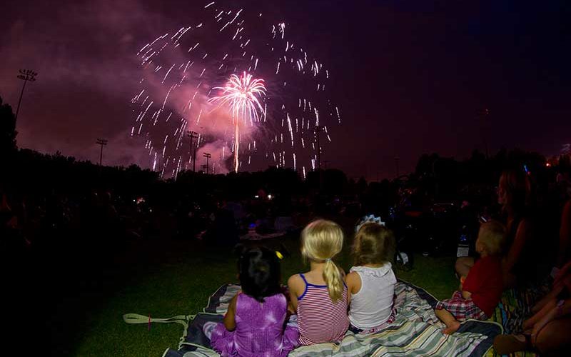 kids watching and enjoying fireworks