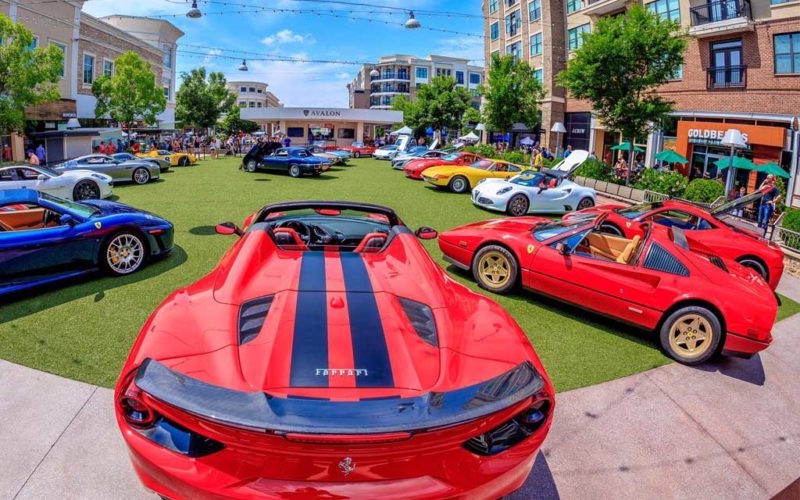 ferrari's and other fancy cars outside at Avalon