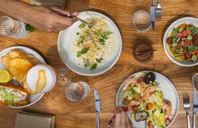 people sharing dishes