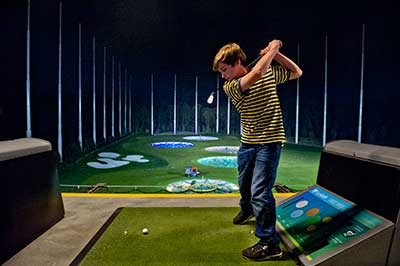 Playing golf at TopGolf