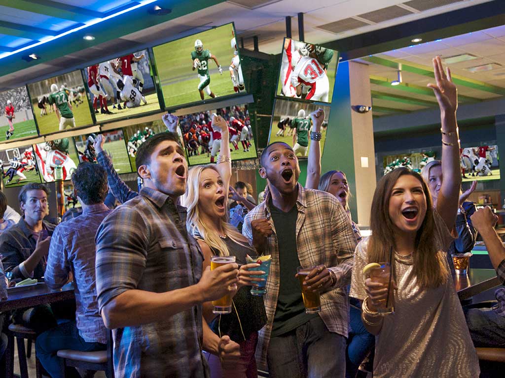 group of friends watching football