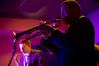 guy playing trumpet