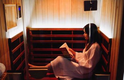 woman sitting in sauna