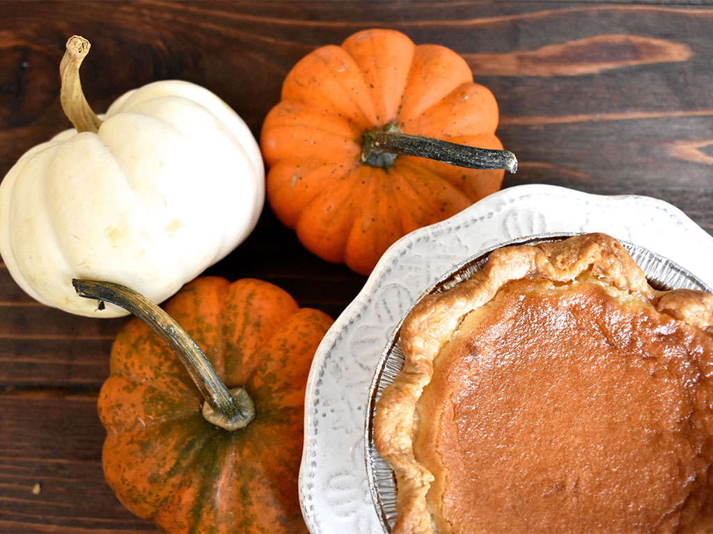pumpkin pie with pumpkins