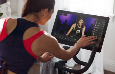 girl on fitness bike