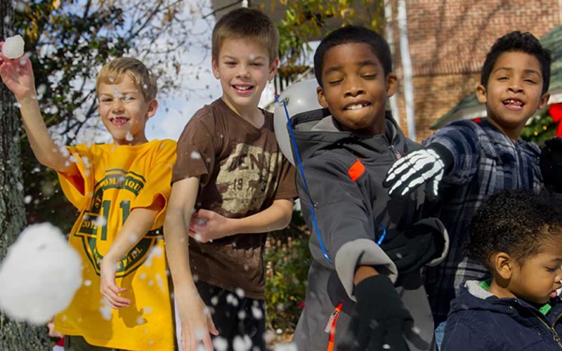 kids throwing snowballs