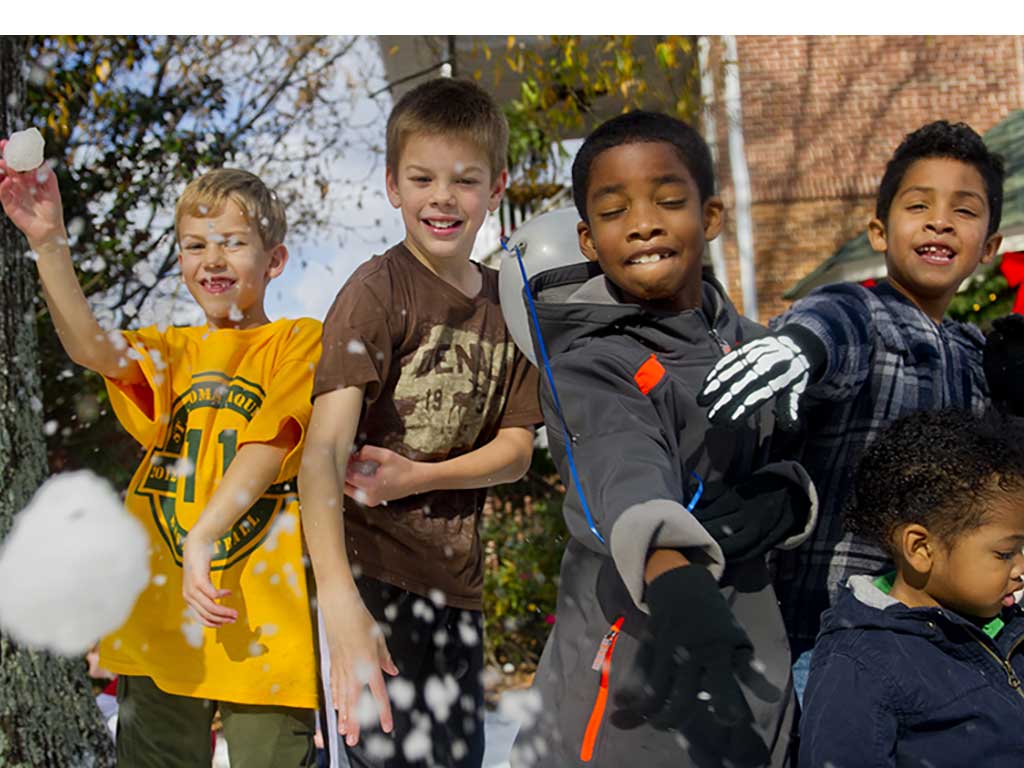 kids throwing snowballs