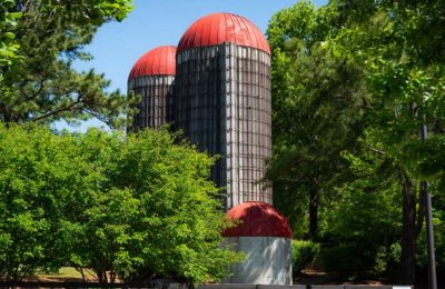 silos surrounded by trees