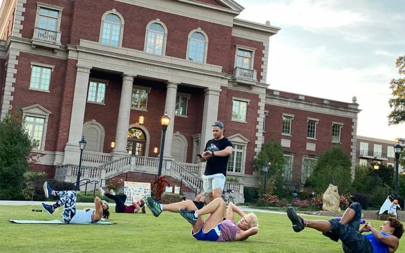 people doing situps outside