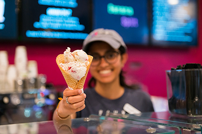 woman holding ice cream cone