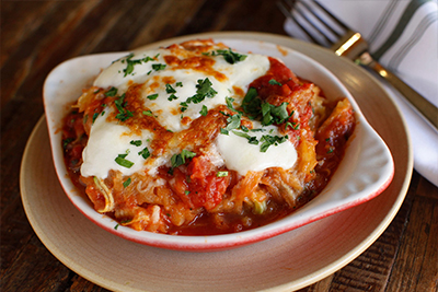 Italian dish with marinara sauce and cheese in a bowl