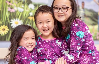 girls in jammies hugging