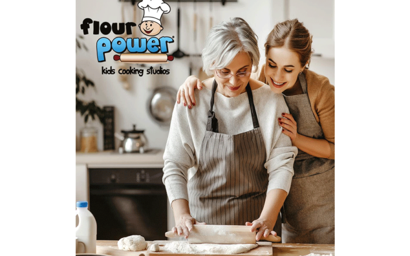 mom and daughter rolling dough