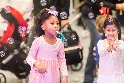 girls celebrating with bubbles