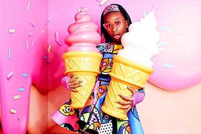 girl with two large ice cream cones