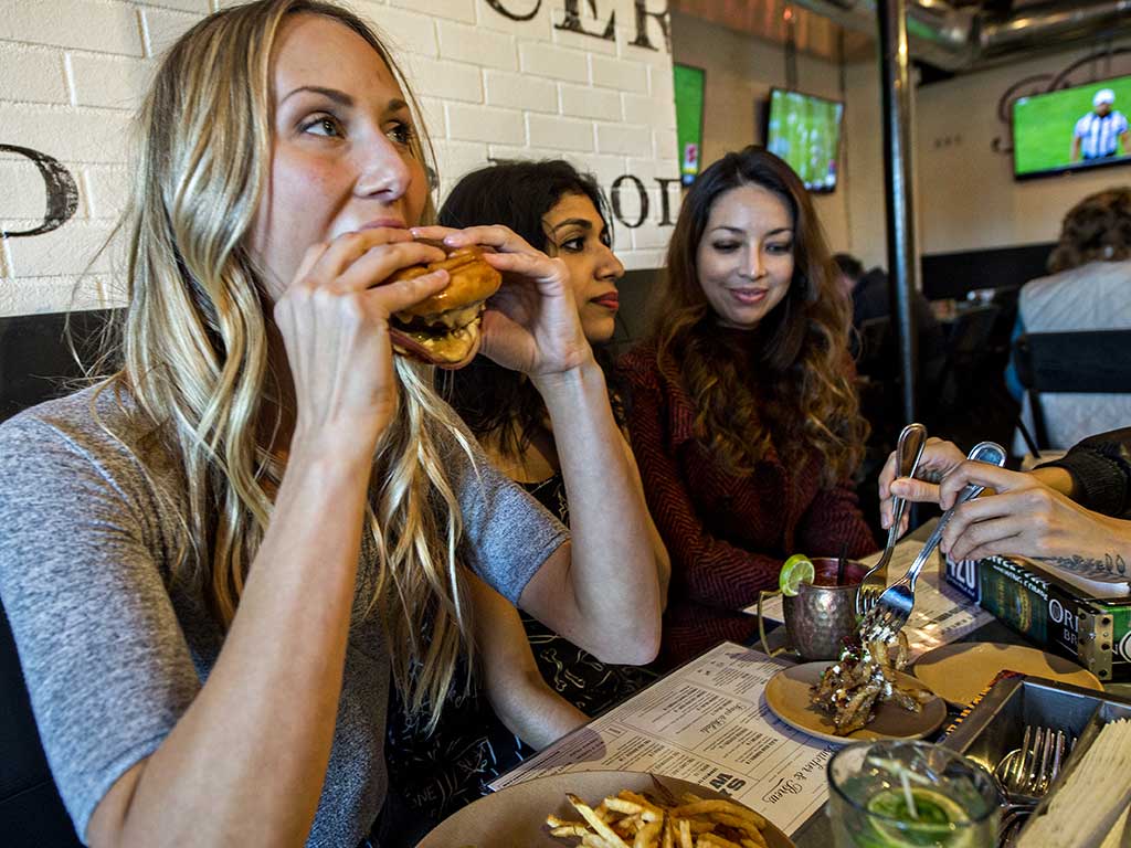 girl eating burger