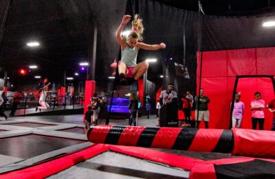 Girl jumping on indoor trampoline