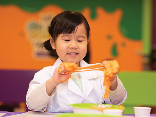 Little kid playing with slime