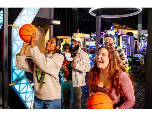 people shooting basketball