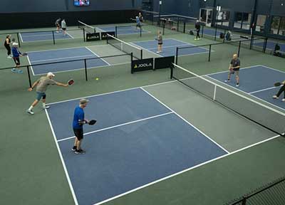 people playing pickelball