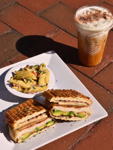 iced drink and a panini.